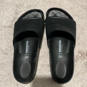Like new plastic Birkenstock slides